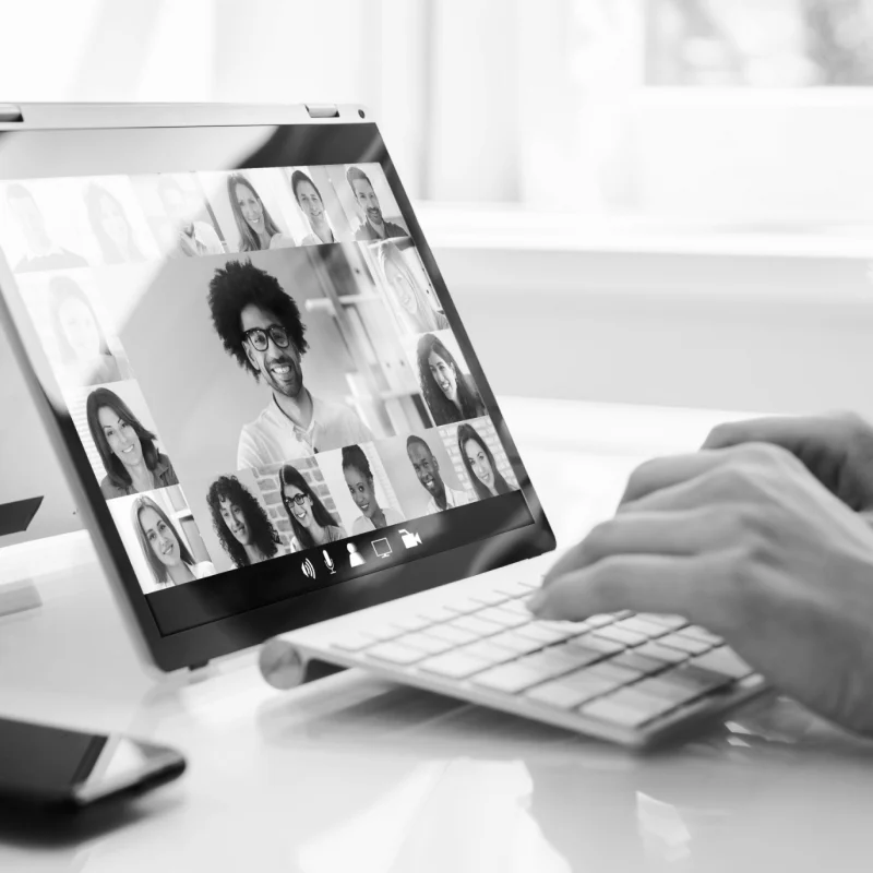 closeup of tablet with online virtual meeting on screen